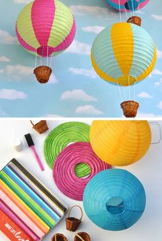 three hot air balloons are being made with colored paper