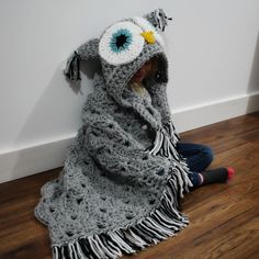 This is a pattern for a Bulky & Quick Owl Blanket which comes in Child and Adult size.This Blanket is designed as a gorgeous hooded fringe throw. Wrap yourself up, forget your worries and be the owl! Or simply lay the blanket over top and admire your cozy owl Blanket. When not in use tuck into a pillow. This fun whimsical design will make any owl fans day and makes the perfect gift!The yarn is held double for the blanket and single for the eyes and other trimming. Crochet Owl Blanket, Bernat Softee Chunky Yarn, Owl Blanket, Crochet Hood, Crochet Owls, Hood Pattern, Owl Crochet Patterns, Crochet Owl, Christmas Knitting Patterns