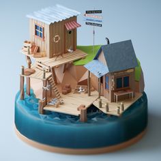 a small wooden house sitting on top of a body of water next to a sign