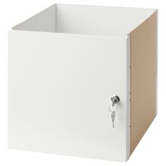 a white cabinet with a key in it