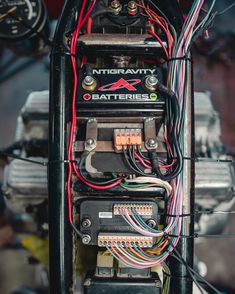 the inside of a car with many wires