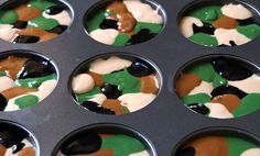 cupcakes with green, brown and white icing in a muffin tin