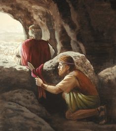 a painting of two people in a cave