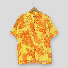 Vintage Hawaiian Pineapples Aloha Tropical Rayon Shirt Large Hawaii Party Disco Sunwear Beach Buttondown Guam Floral Surf Button Up Size L Good Used Condition. No holes and stains. Size (On Tag) : Size L **To make sure if it FITS YOU, refer at the exact measurements. Size Measurement (All measurements were taken lying flat) : Width [armpit to armpit] : 21 inches / 53 cm Length [shoulder to end of garment] : 26 inches / 66 cm THIS IS USED CLOTHING! PLEASE DON`T EXPECTED IT TO BE LIKE NEW OR DON`T Cheap Collared Hawaiian Tops, Cheap Cartoon Print Tank Top For Summer, Collared Camp Shirt With Buttons For Beach, Beach Hawaiian Shirt With Button Closure, Summer Beach Hawaiian Shirt With Button Closure, Summer Hawaiian Button-up Shirt For Beach, Summer Button-up Hawaiian Shirt For Beach, Hawaiian Shirt With Button Closure For Beach, Vacation Camp Shirt With Buttons