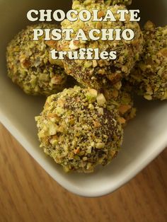 chocolate pistachio truffles in a white bowl on a wooden table with text overlay