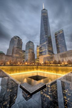 the world trade center and one world trade center in new york city, ny at night