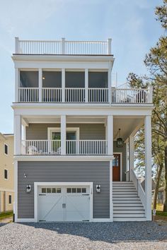 a two story house with an attached garage