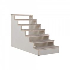 a set of white stairs with no railings on the bottom and bottom, against a white background