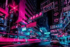 a city street filled with lots of neon lights