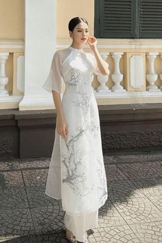 Hy Vien Middle Sleeves Ao Dai | MEAN BLVD Ao Dai Modern Fashion, Ao Dai Graduation, Sangjit Dress, Wedding Hanbok, Chinese Dress Modern, Ao Dai Modern, Modern Ao Dai, Ao Dai Wedding, Chinese Fancy Dress