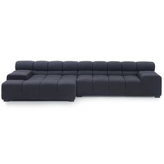 a black sectional couch sitting on top of a white floor