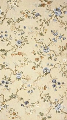 an old fashioned wallpaper with blue and white flowers on beige background, from the early 20th century