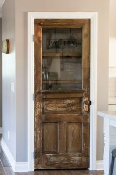 an old wooden door with glass on the front and side panels, is displayed in this instagram