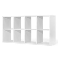 a white bookcase with six cubes on top and one section missing from the front