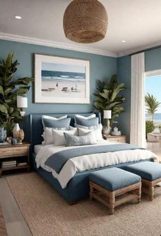 a bedroom with blue walls and white bedding, large windows, potted palm trees