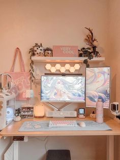 a desktop computer sitting on top of a wooden desk