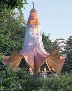 people are sitting in the shade under an unusual structure