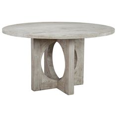 a white table with an oval wooden base and two circular holes in the center, on a