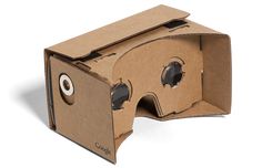 an open cardboard box with two eyeballs on the front and one in the back