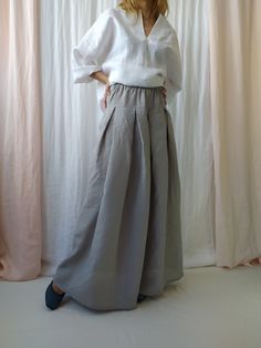 "Maxi linen skirt with pockets is perfect choice when you need casual, comfortable and stylish outfit combination. High waist linen skirt is clothing piece that can be easily paired with any top and creates a charming feminine look. Before placing an order, check the approximate measurements given below. If you are unsure about your size or would like to adjust the length of the item, you could leave your personal measurements (height, waist and hips) in a personalization box. SIZE and FIT Size Spring Skirt Bottoms With Pockets, Bohemian Bottoms With Side Pockets For Spring, Spring Bohemian Bottoms With Side Pockets, Chic Long Skirt With Side Pockets, Spring Long Gathered Skirt, Baggy Cotton Bohemian Skirt, Spring Flared Skirt With Pockets, Spring Flared Skirt Bottoms With Pockets, Bohemian Baggy Cotton Skirt