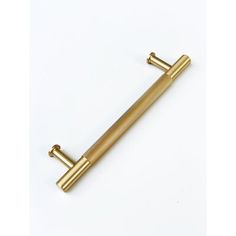 an antique brass door handle on a white background