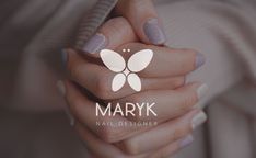 a woman's hands with manicured nails holding a nail polish bottle and the words maryk on it