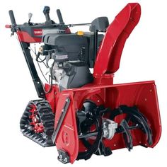 a red snow blower sitting on top of a white background