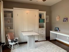 a white desk and chair in a room