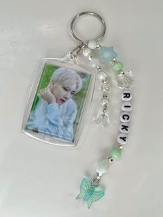 a keychain with a photo on it