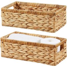 two wicker baskets with rolls of toilet paper in them and one has a tissue dispenser