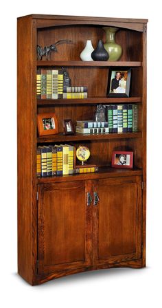 a wooden book shelf filled with lots of books