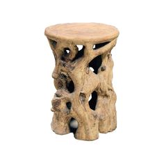 a small stool made out of wood with holes in the top and bottom, sitting on a white background