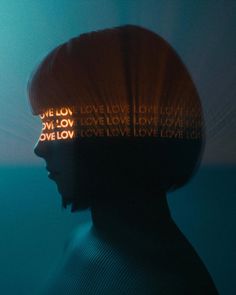 the silhouette of a woman with words projected on her face