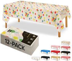 the table cloth is decorated with colorful polka dots and has wooden legs for easy storage