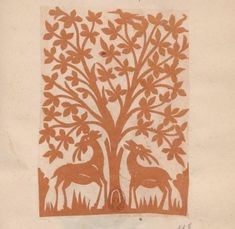 an orange and white paper cut depicting two deer under a tree with leaves on it