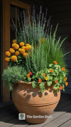 a large planter filled with lots of flowers