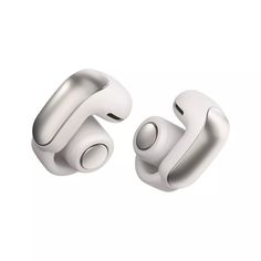 two white ear buds sitting next to each other