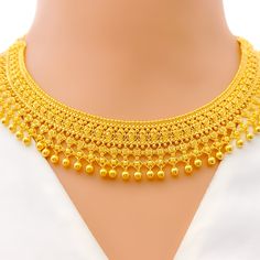 This 22k gold traditional necklace set features a glimmering tasseled design, perfect for adding elegance to any outfit. Weighing 61.6 grams, it showcases a yellow gold finish that enhances its intricate and radiant appearance. The set has a length of 17 inches with adjustable 1.5-inch links for a comfortable fit. Secured with a hook lock, it combines style and practicality. The matching earrings, each 2.5 inches long, feature screw back posts for added security. Ideal for those who appreciate luxurious and timeless jewelry, this set brings a touch of opulence and traditional charm to your collection. PRODUCT DETAILS Gold Purity(karat): 22k Gold Weight(grams): 61.6 Item Finish: Yellow Gold Set Length: 17" Adjustable Links: 1.5" Links Lock Style: Hook Lock Matching Earrings: Included Earrin Unique Gold Jewelry Designs, 22k Gold Earrings, 22k Gold Necklace, Bridal Necklace Designs, Pure Gold Jewellery, Bridal Jewelry Necklace, Precious Stones Rings, Gold Bridal Jewellery Sets, Diamond Pendant Sets