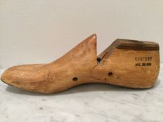 "An antique wood shoe form. Leather patches detail the shoe last. The slender foot features a \"55XX\" marking. CONDITION In good condition with wear consistent with age and use. There is a a gorgeous patina to the wood and leather. MEASUREMENTS Length: 11.125\" ... 28.3 cm Width: 3.5\" .. 8.9 cm Height: 4\" ... 10.2 cm Thanks for looking! You won't be able to pay at checkout. I invoice, so send your best email as you checkout." Web Design Awards, Wood Shoe, Shoe Molding, Leather Craftsmen, Wood Shoes, Shoe Last, Vintage Clock, How To Antique Wood, Primitive Decorating