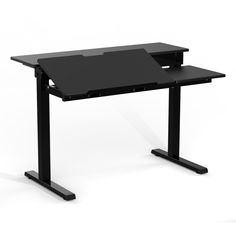 a black computer desk sitting on top of a white floor