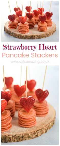 strawberry heart pancake stacks on a wooden plate with strawberries in the shape of hearts