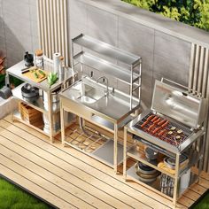 an outdoor bbq grill on a wooden deck