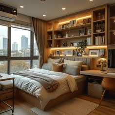 a bedroom with a bed, desk and bookcases in front of a large window