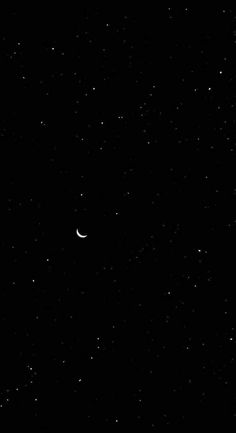 the night sky is full of stars and a half moon