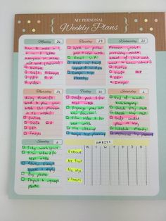 a planner with the words weekly piano written in different colors and sizes on top of it