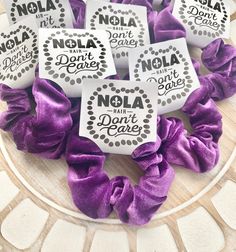 purple hair scrunffles on a plate with nola don't care tags