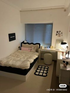 a bedroom with a bed and desk in it