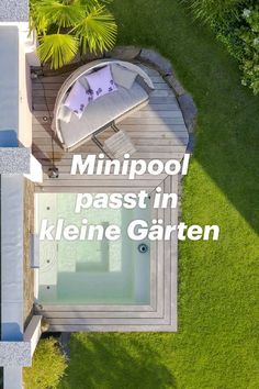 an aerial view of a backyard with a hot tub