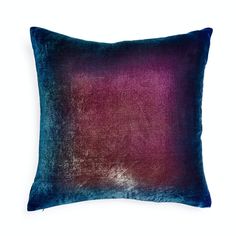 a purple and blue velvet pillow on a white background, with the back side of it showing