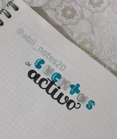 an open notebook with the words actio written in spanish and english on top of it